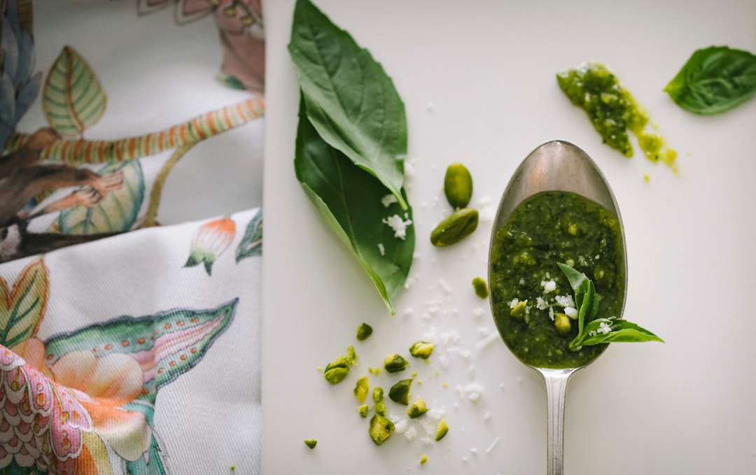 green leaves and gray spoon