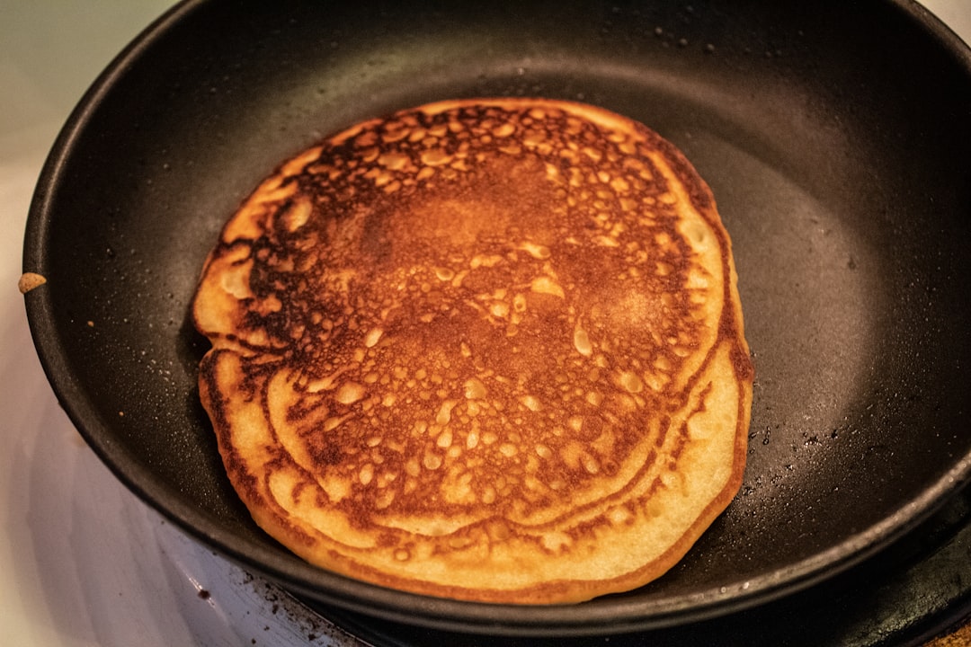 brown and black pastry on black pan